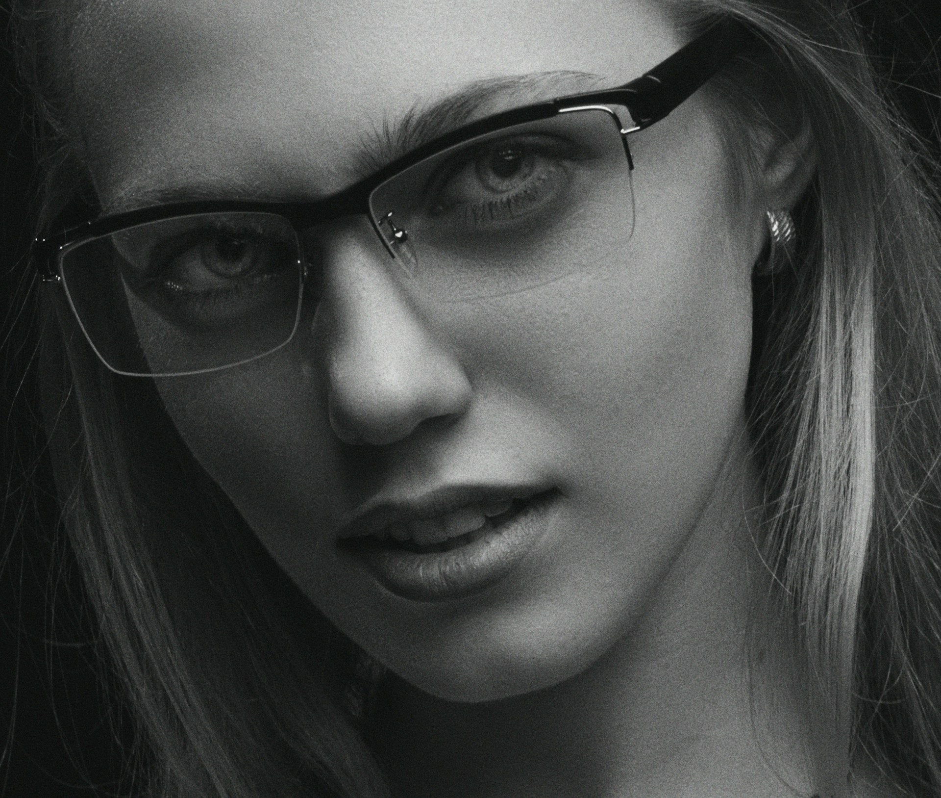 Woman wearing stylish acetate glasses from Main Frame Eyewear, showcasing a perfect fit and fashionable frame.